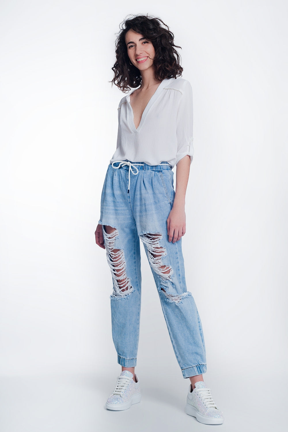 Jogger en jean déchirés bleu clair délavé