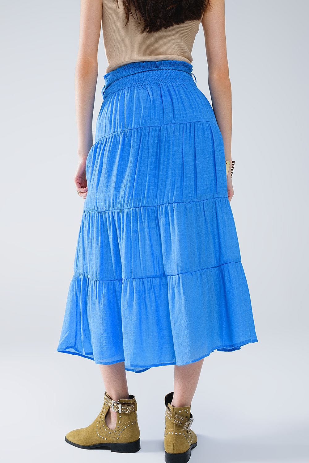 Jupe longue à pinces en bleu avec taille élastique et détails en coquillage