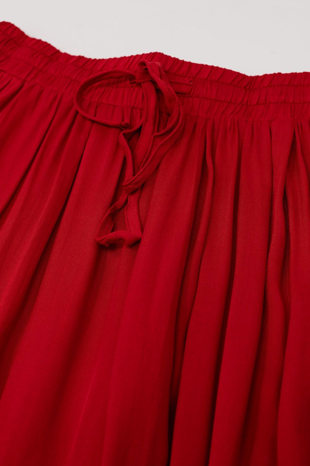 Jupe longue en tissu fluide rouge avec taille élastique