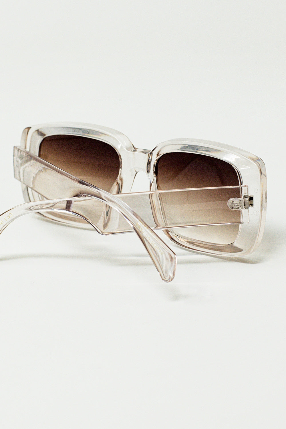 Lunettes de soleil rectangulaires surdimensionnées en blanc transparent