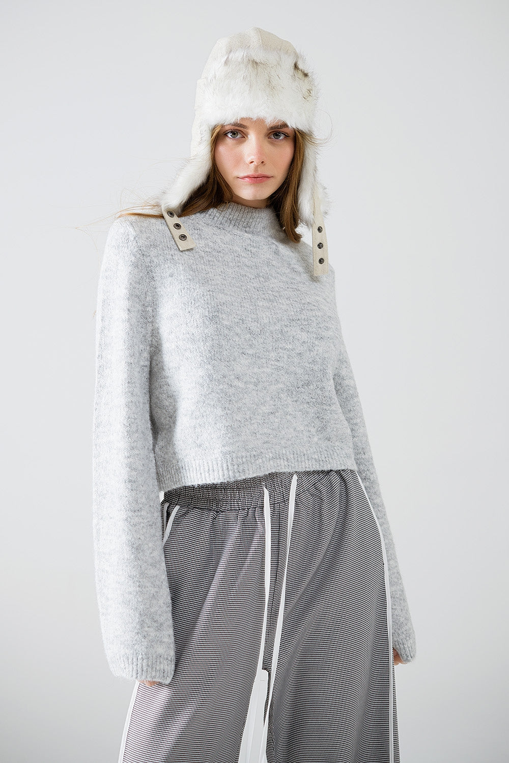 Maillot gris à manches longues et dos ouvert