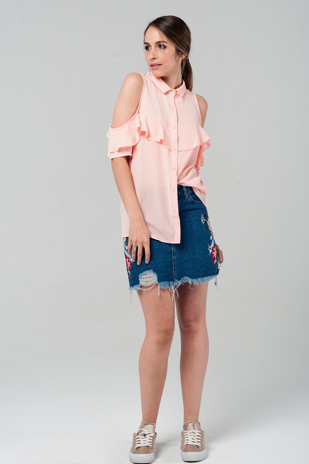 Mini jupe en denim avec fleurs brodées