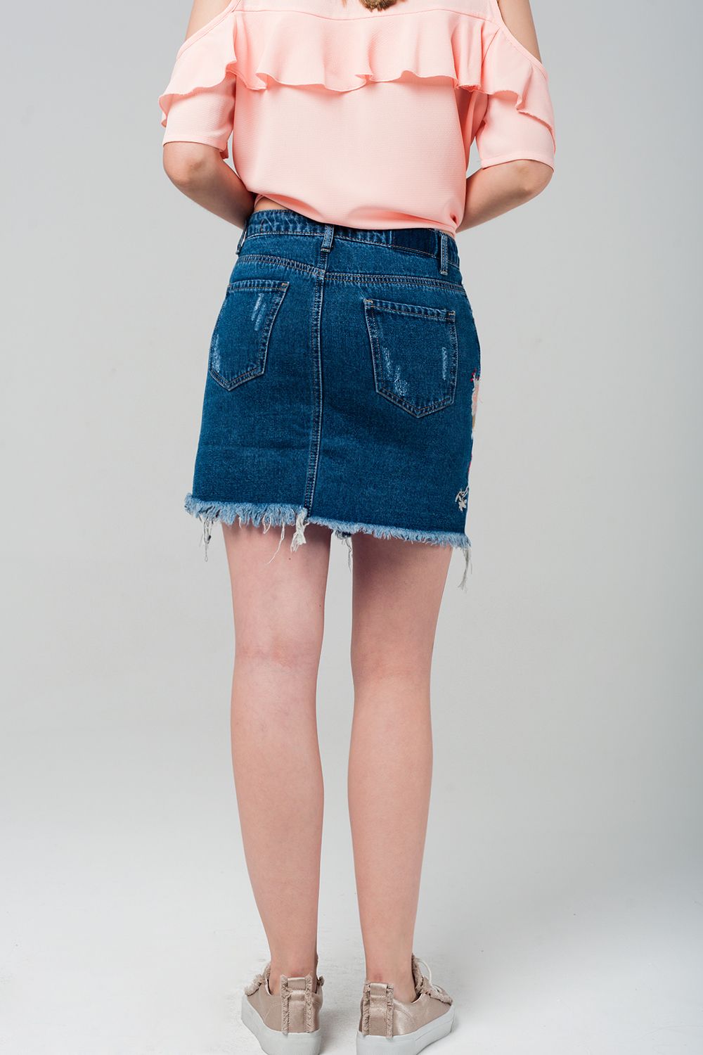 Mini jupe en denim avec fleurs brodées