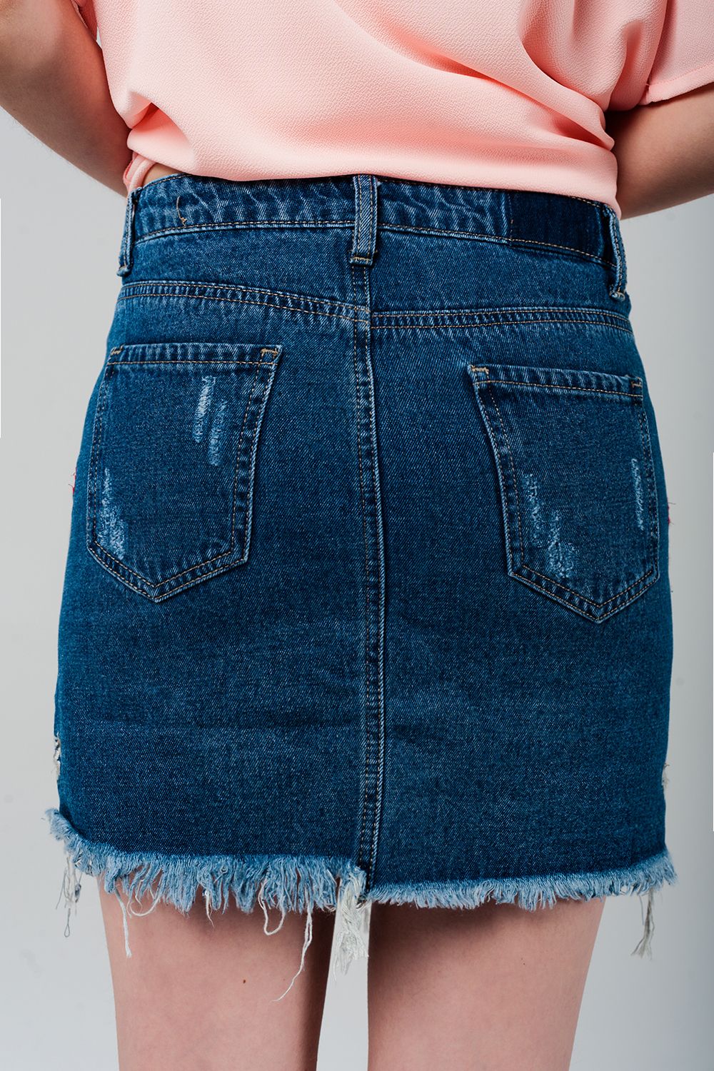 Mini jupe en denim avec fleurs brodées