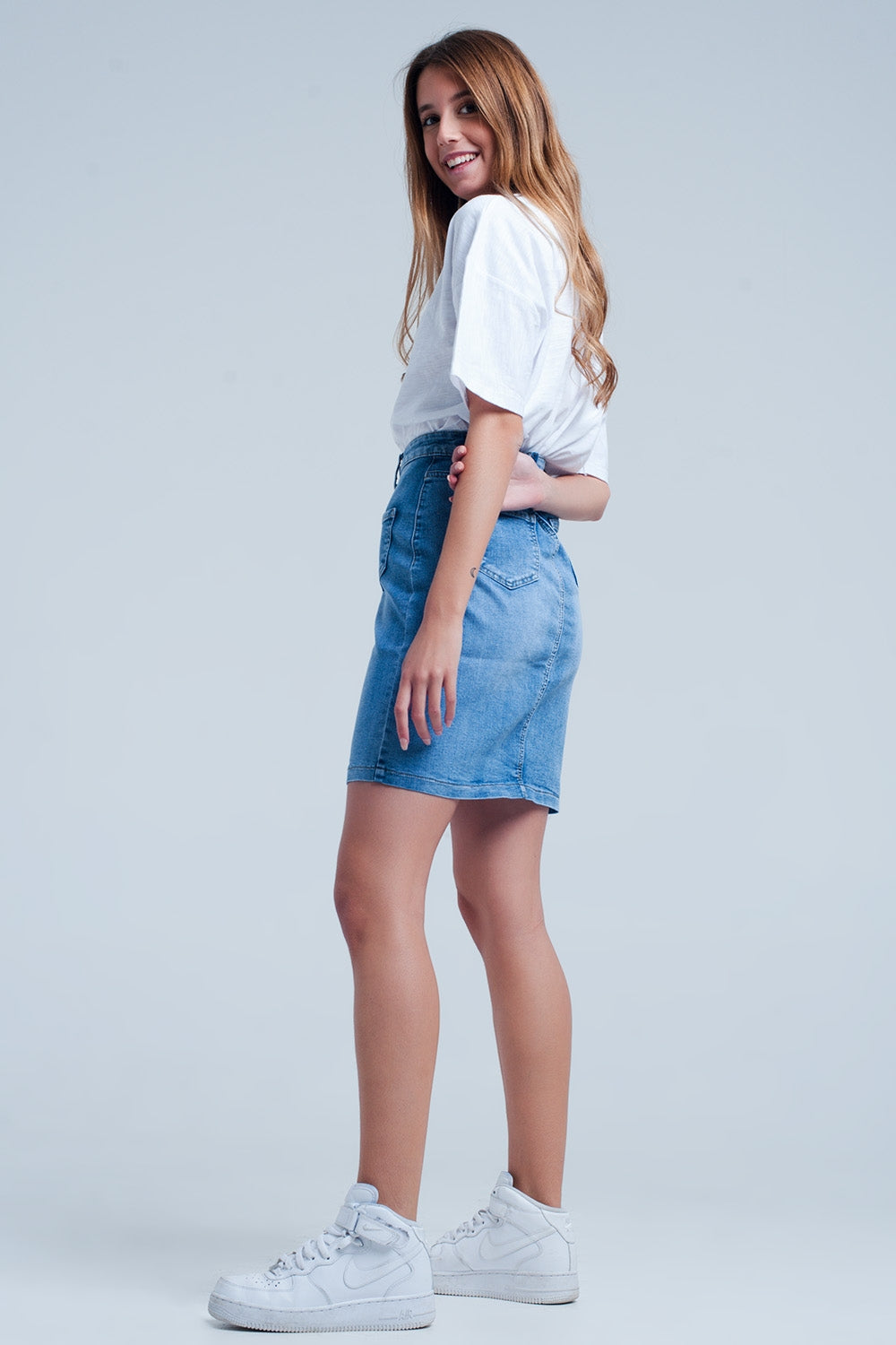 Mini-jupe en jean boutonnée