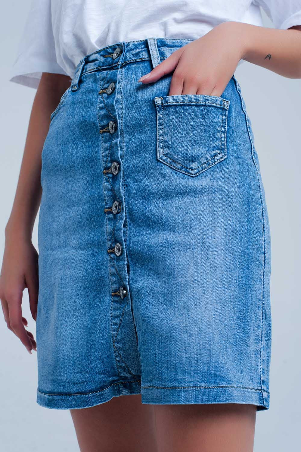 Mini-jupe en jean boutonnée