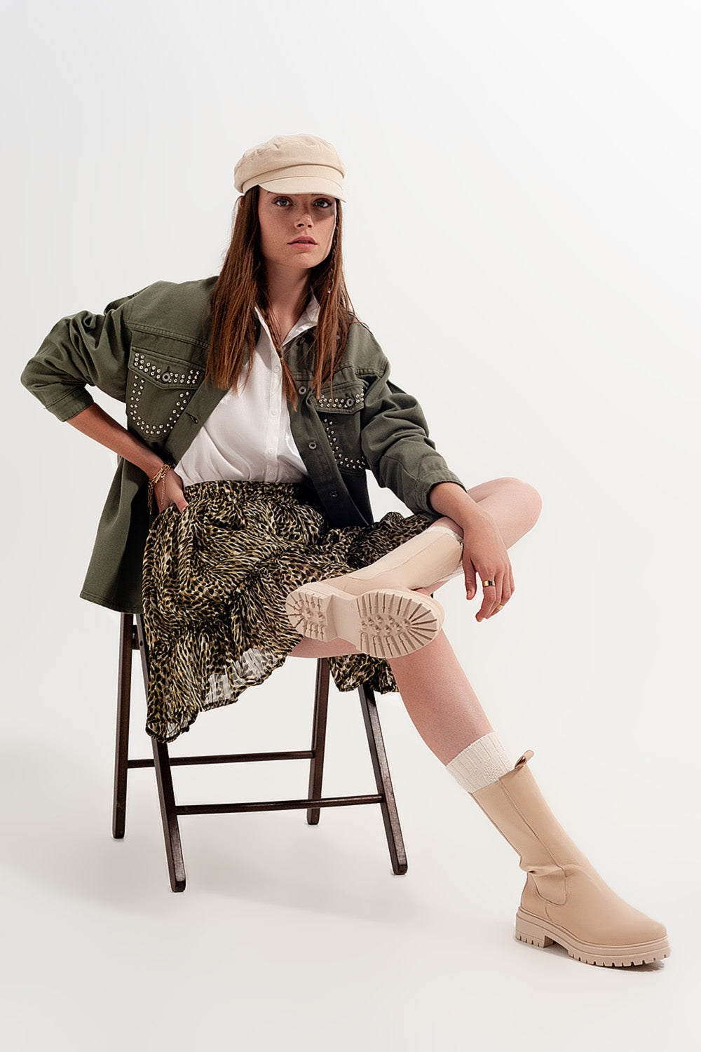 Q2 Mini-jupe en mousseline de soie verte avec taille élastique et tissu brillant