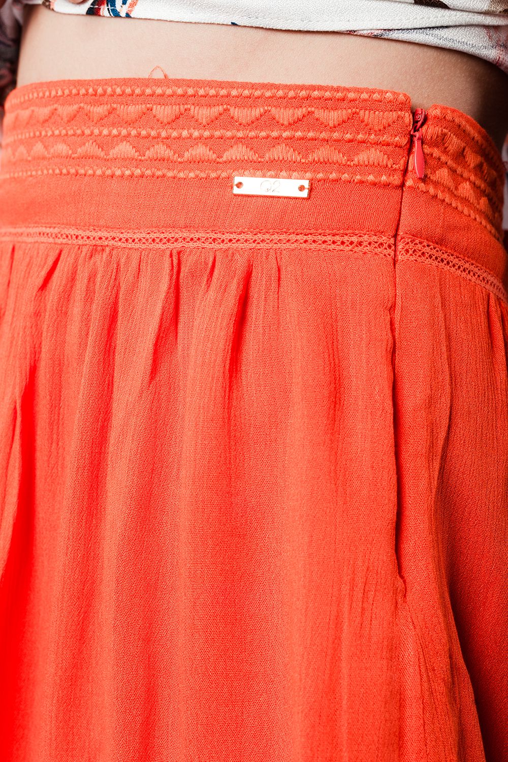 Mini jupe orange esprit aztèque