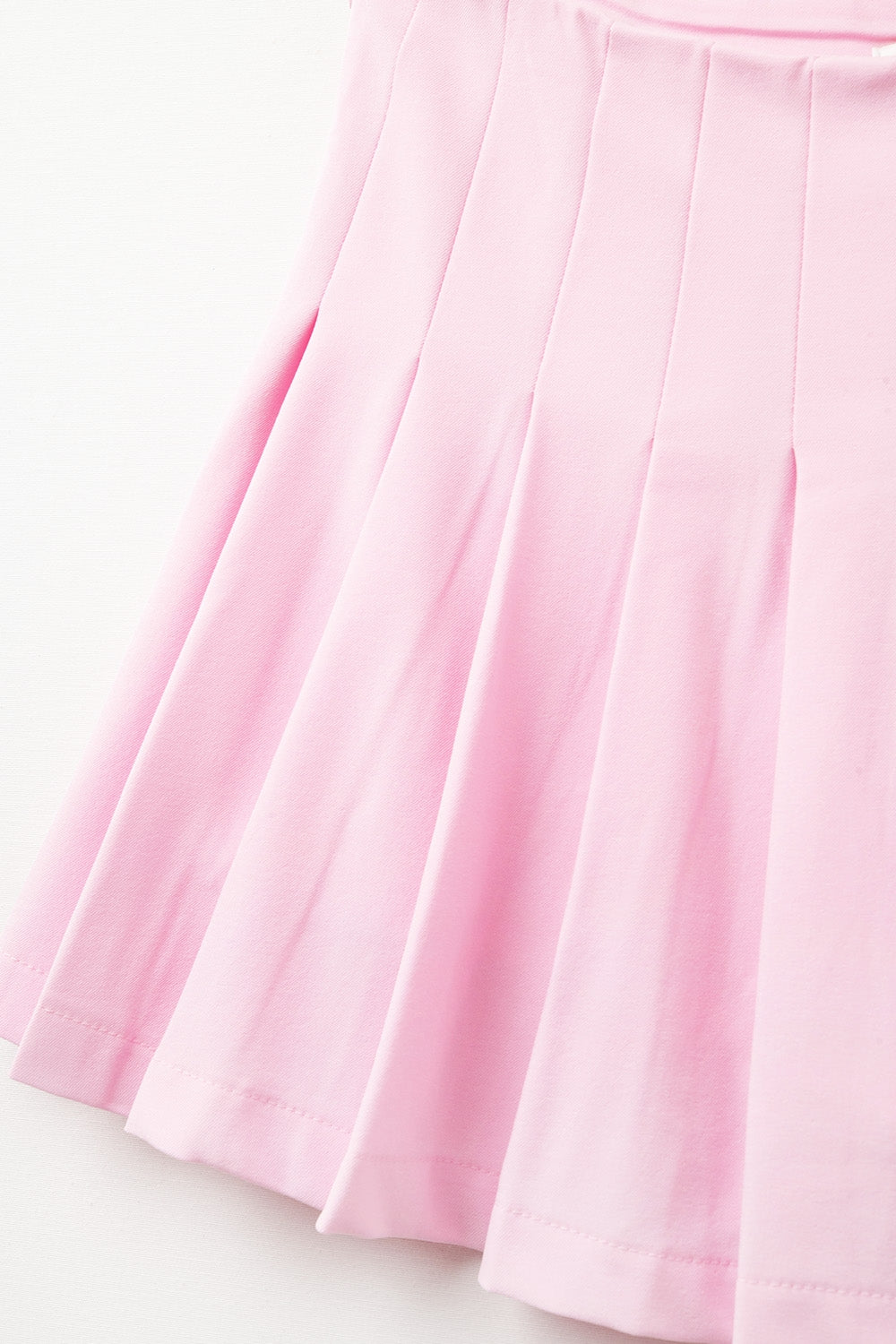 mini-jupe plissée rose