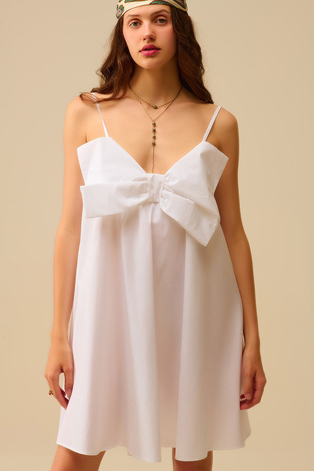 Mini robe en popeline blanche avec un gros nœud