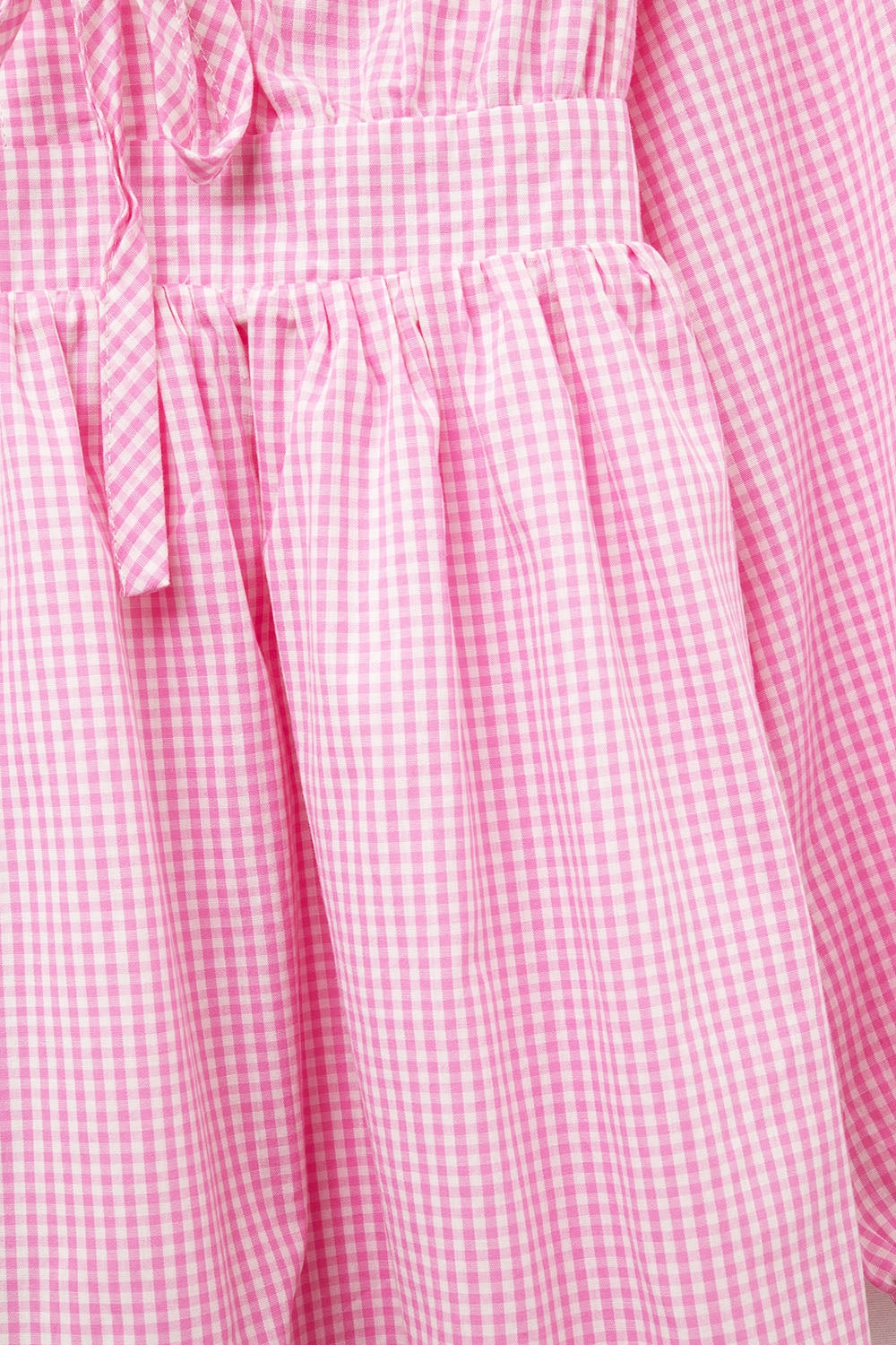 Mini robe vichy à nouer sur le devant rose