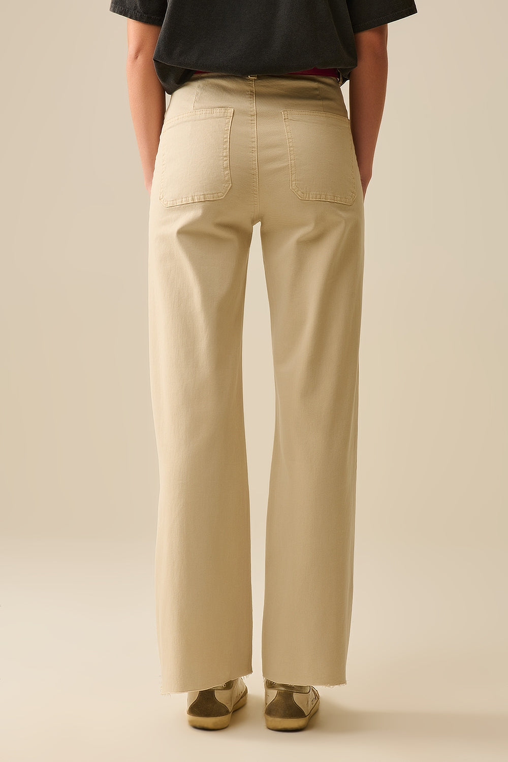 pantalon à jambes larges avec poches avant en beige