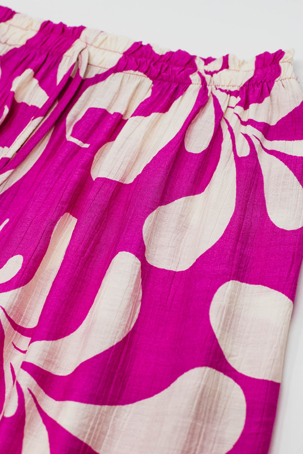 Pantalon droit à taille élastiquée imprimé floral fuchsia