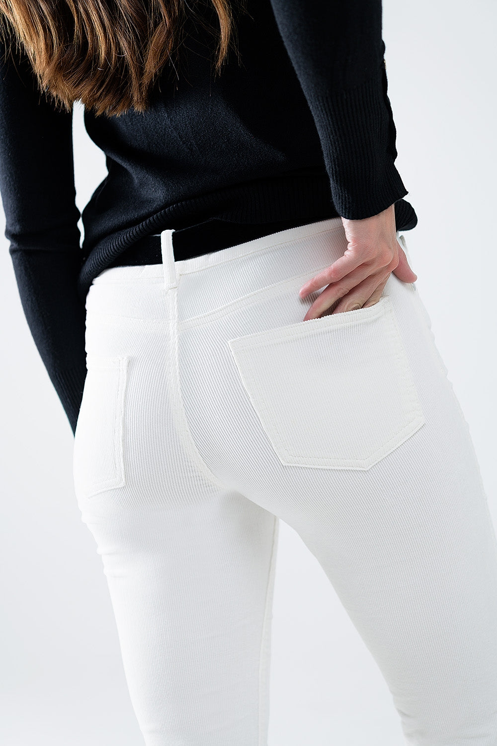 Pantalon évasé en velours côtelé crème avec imprimé léopard sur le bas