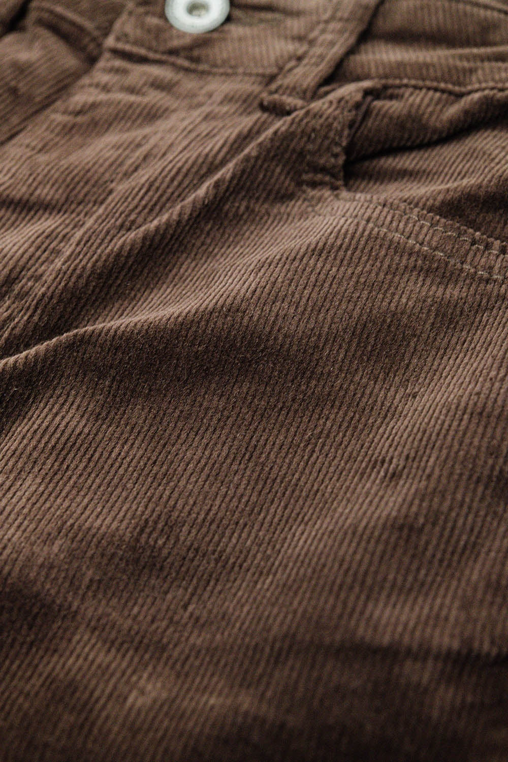 Pantalon évasé en velours côtelé marron avec imprimé léopard sur le bas