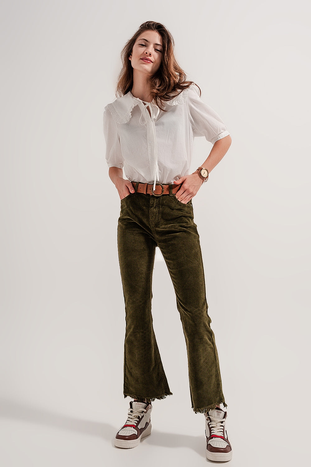 Pantalon évasé en velours côtelé vert