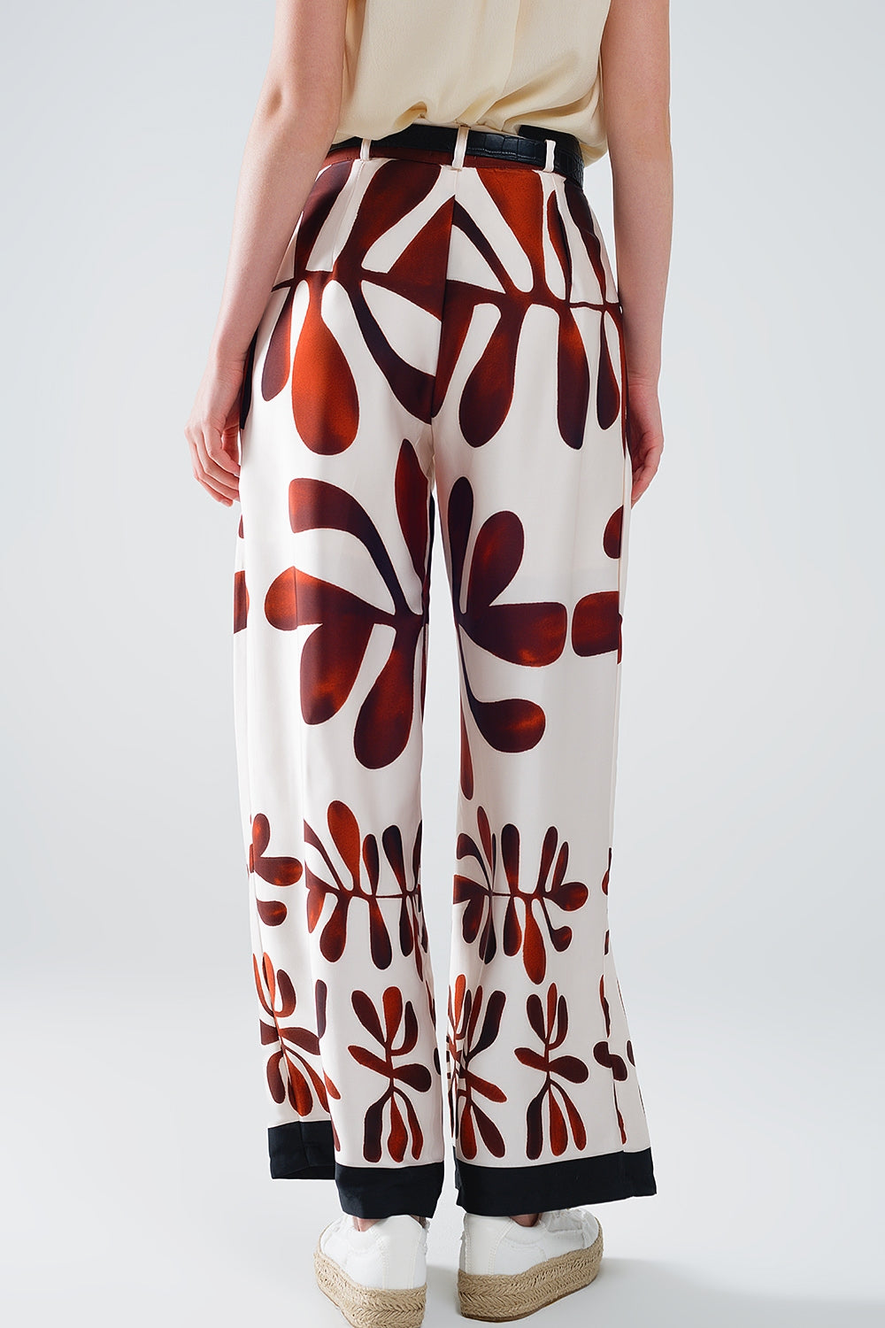 Pantalon large à imprimé abstrait en blanc et marron