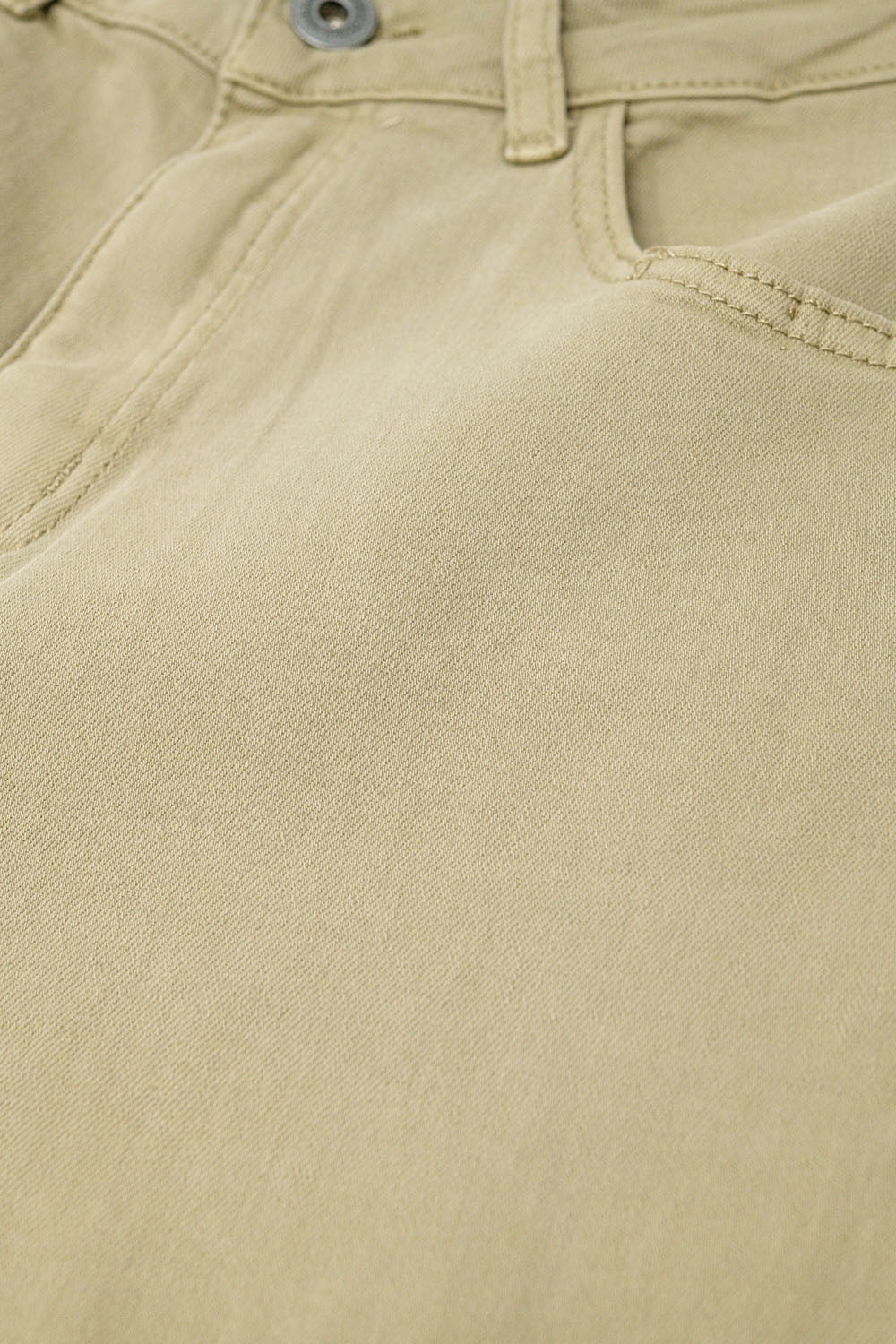 Pantalon large beige avec imprimé léopard sur le bas