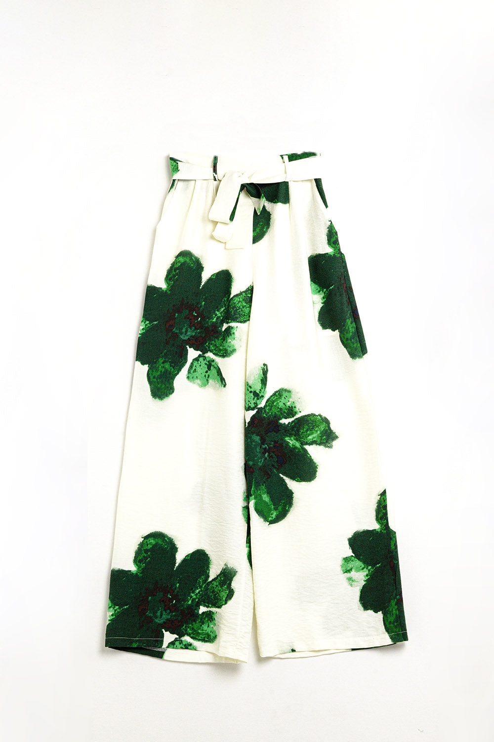 Pantalon Palazzo blanc avec imprimé de fleurs tropicales vertes et ceinture assortie