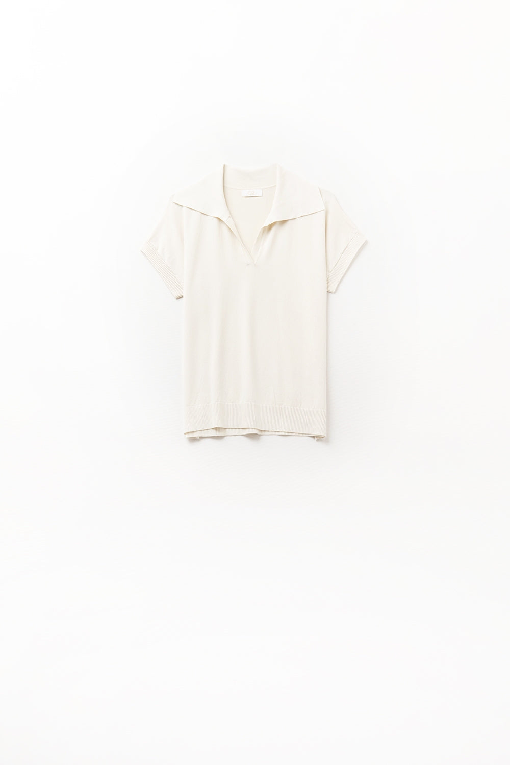 polo en maille fine beige à manches courtes