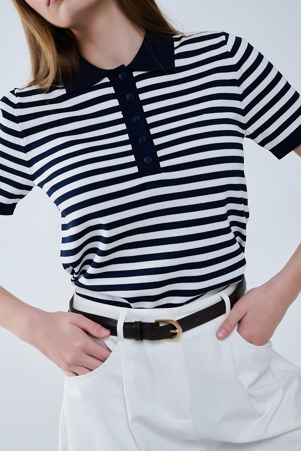 Polo en maille rayée marine et blanche