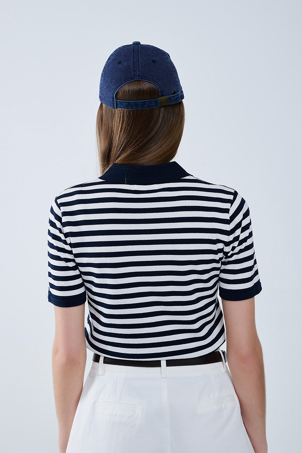 Polo en maille rayée marine et blanche
