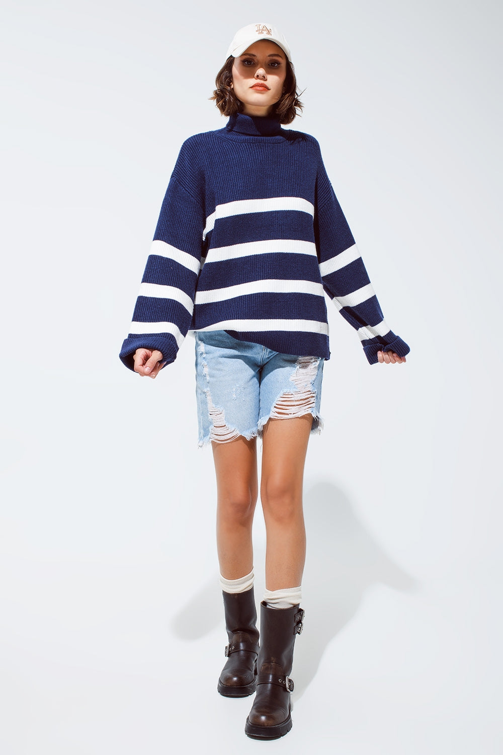 Pull à col roulé bleu marine à rayures