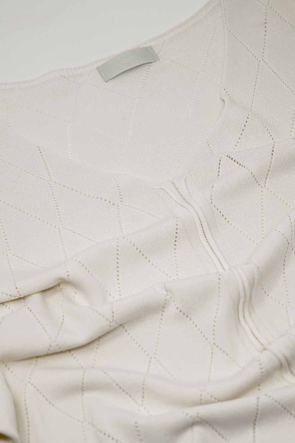 Pull beige à manches courtes avec motif Argyle