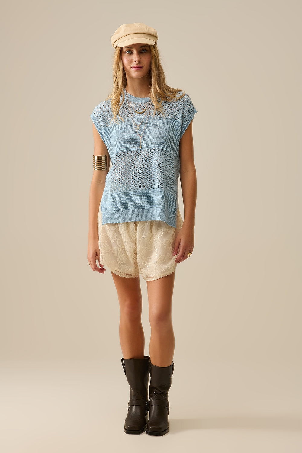 Pull bleu en maille ouverte douce et manches tombantes