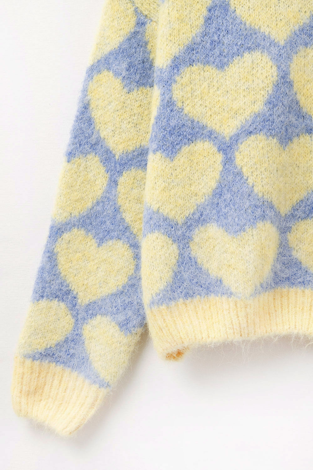 Pull bleu oversize super doux avec coeurs jaunes