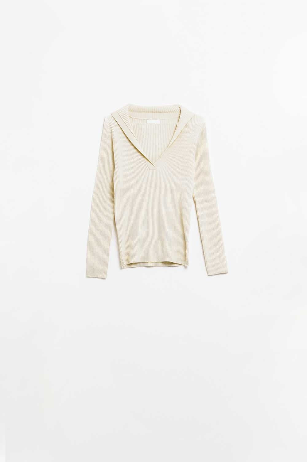 Pull côtelé à col crème et manches longues