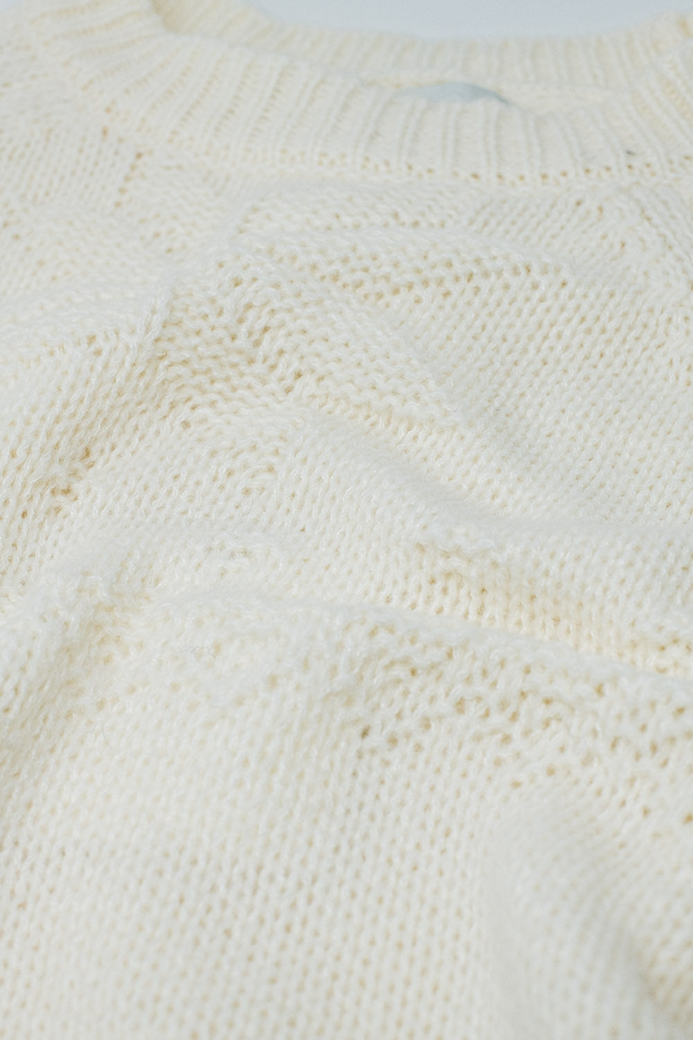 Pull crème avec détails de Noël