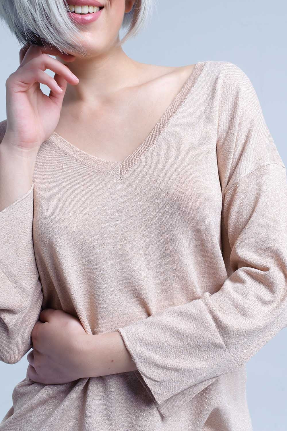Pull en maille rose avec détail en lurex doré