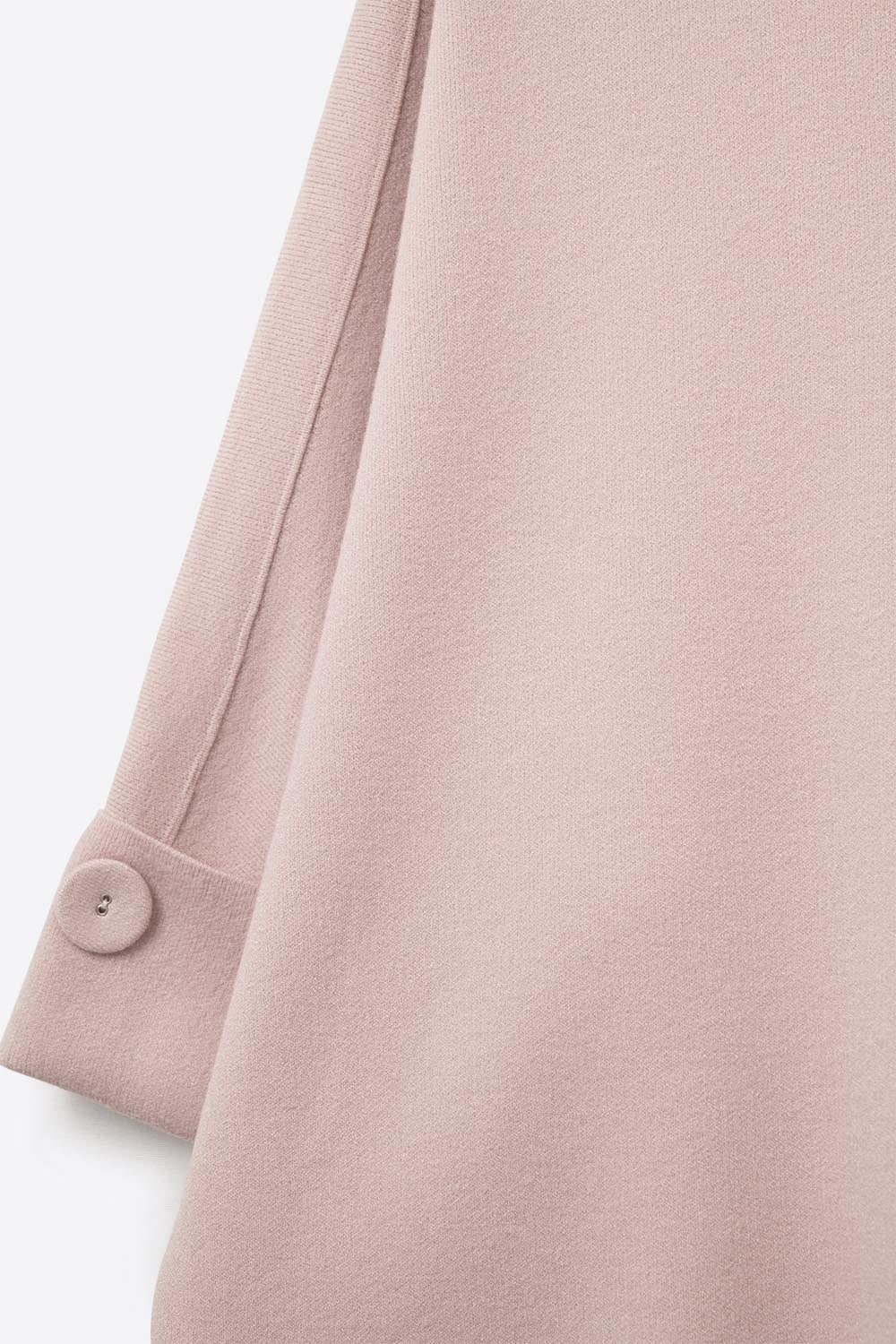Pull en maille rose avec détails de boutons