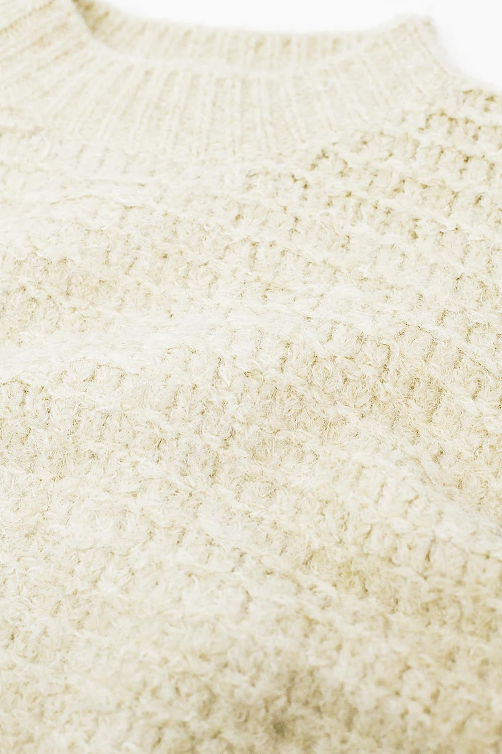 Pull en tricot beige avec manches ballon