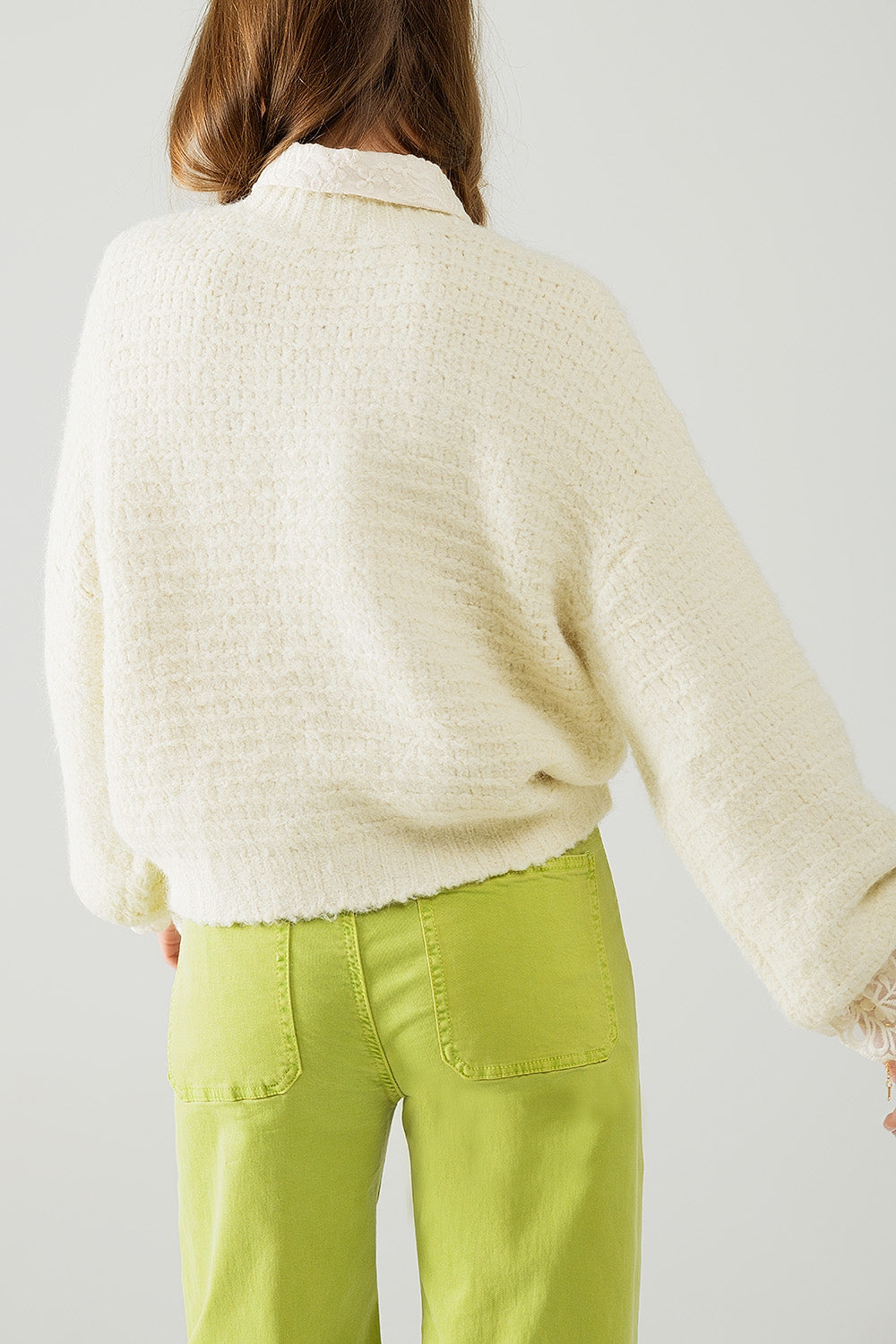 Pull en tricot beige avec manches ballon