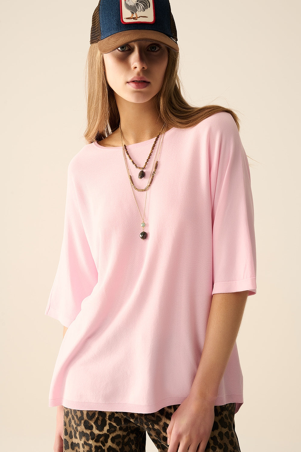 pull oversize en rose avec manches coudées