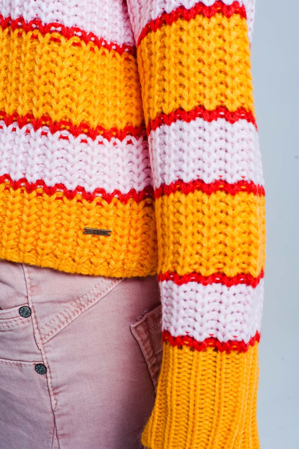Pull rayé effet couleur block orange et rose