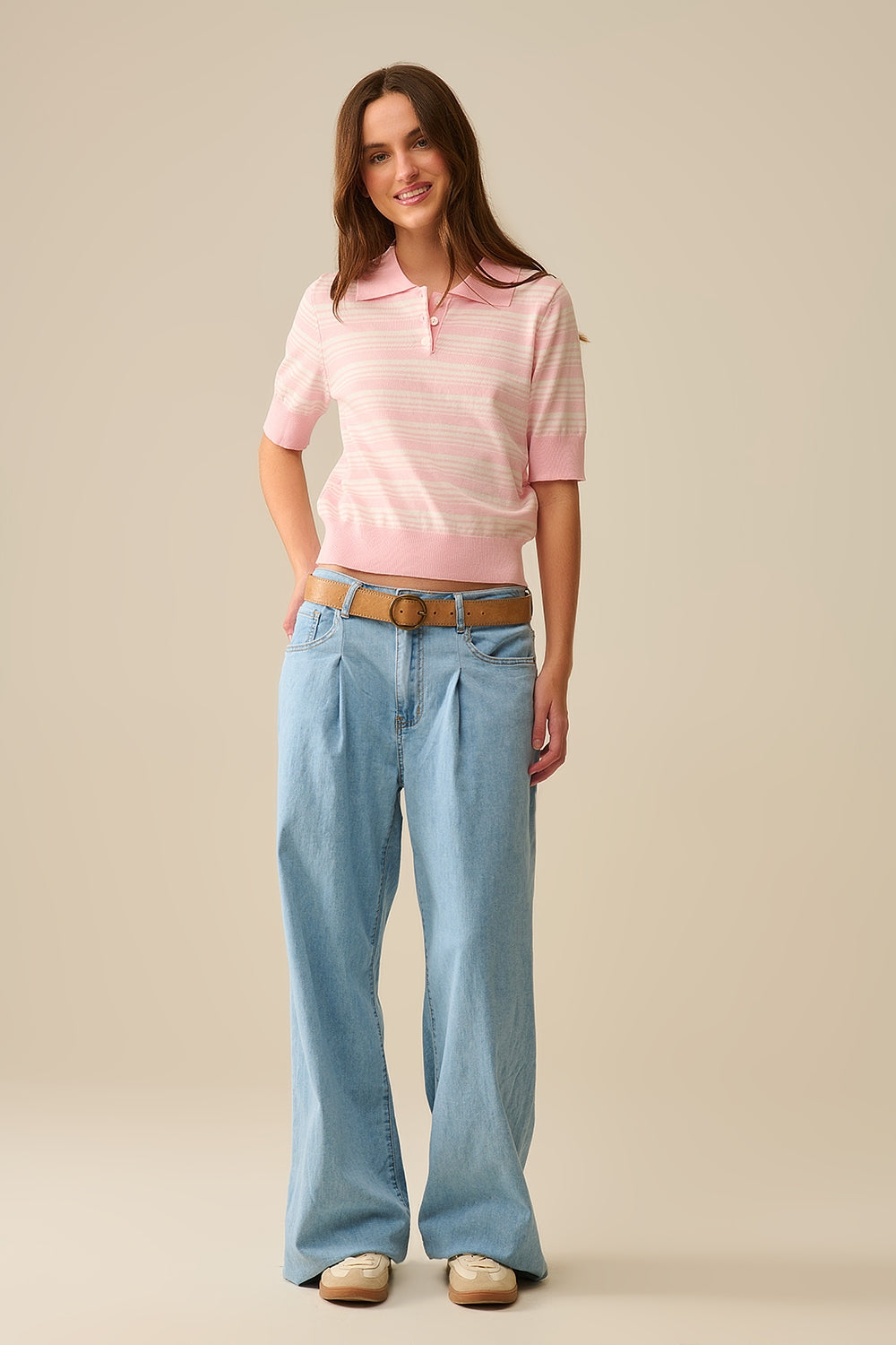 Pull rayé rose et blanc à col polo