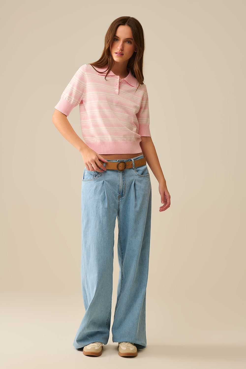 Pull rayé rose et blanc à col polo