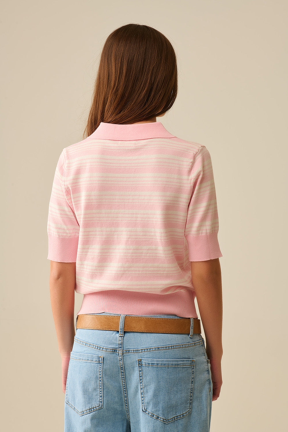 Pull rayé rose et blanc à col polo