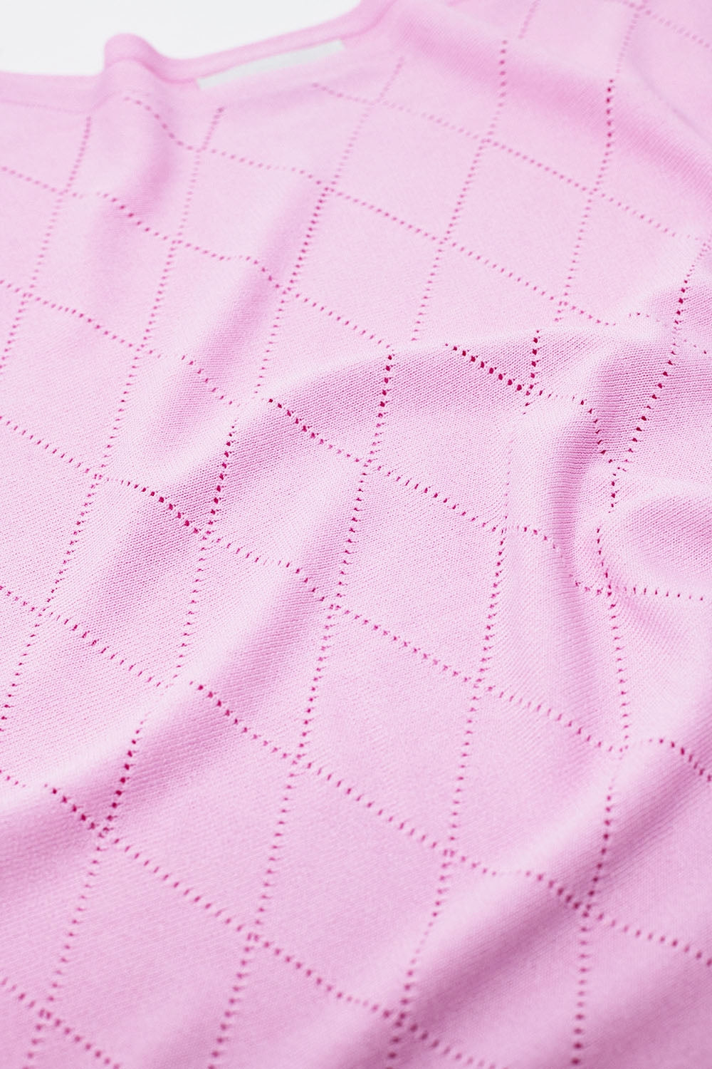 Pull rose pâle à col bateau