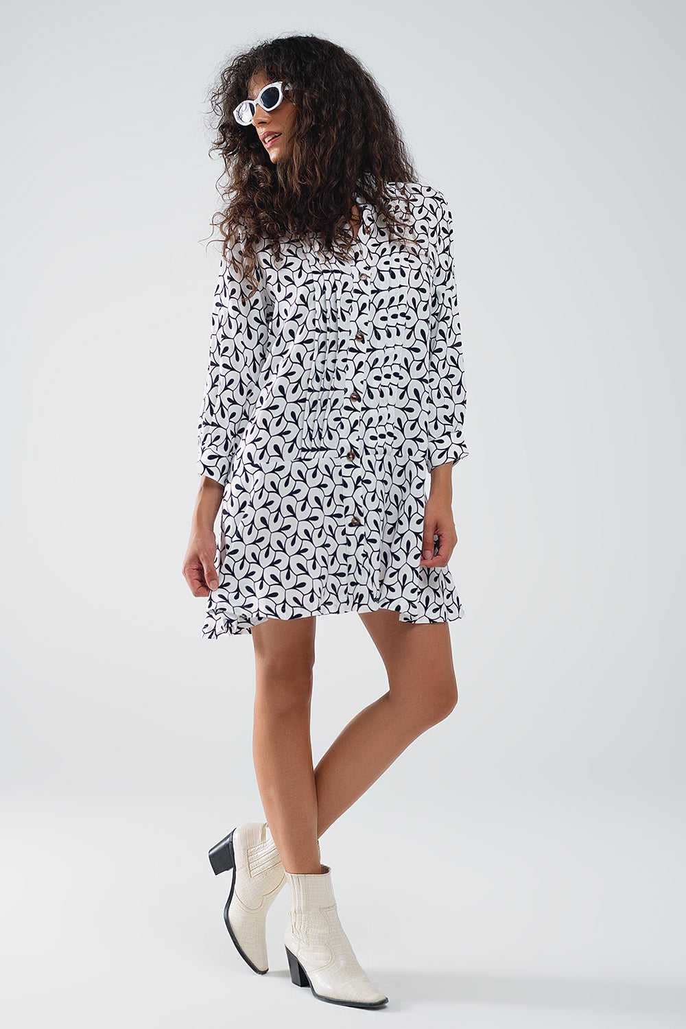 Robe à col polo à manches longues avec imprimé abstrait