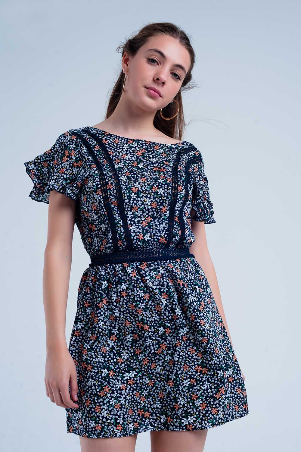 Robe couleur marine à fleurs avec arrière ouvert