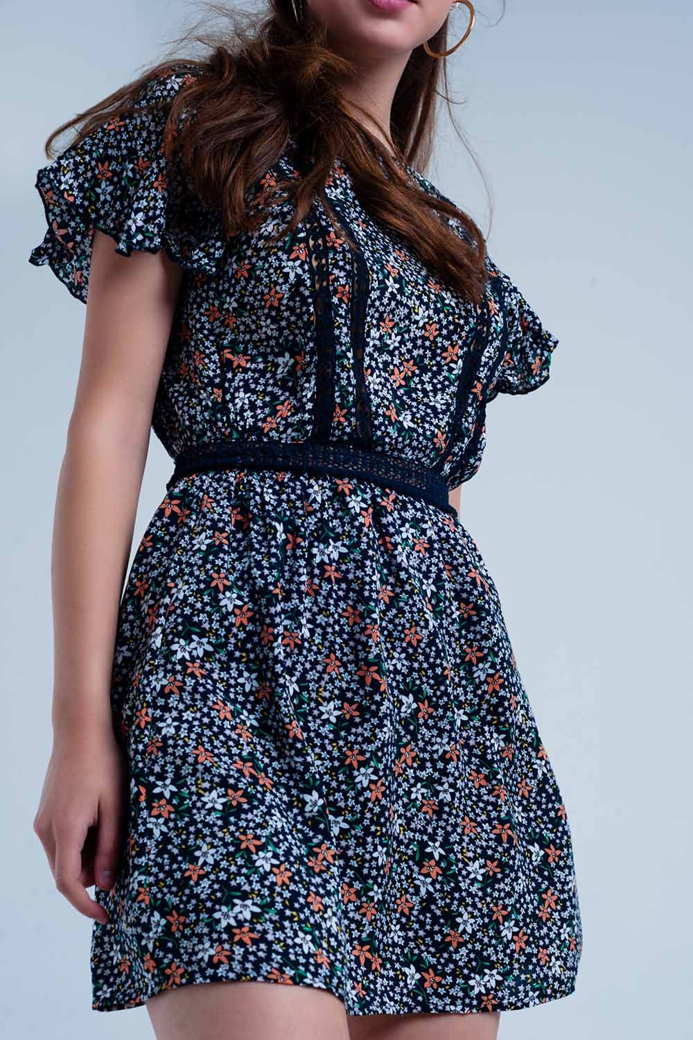 Robe couleur marine à fleurs avec arrière ouvert