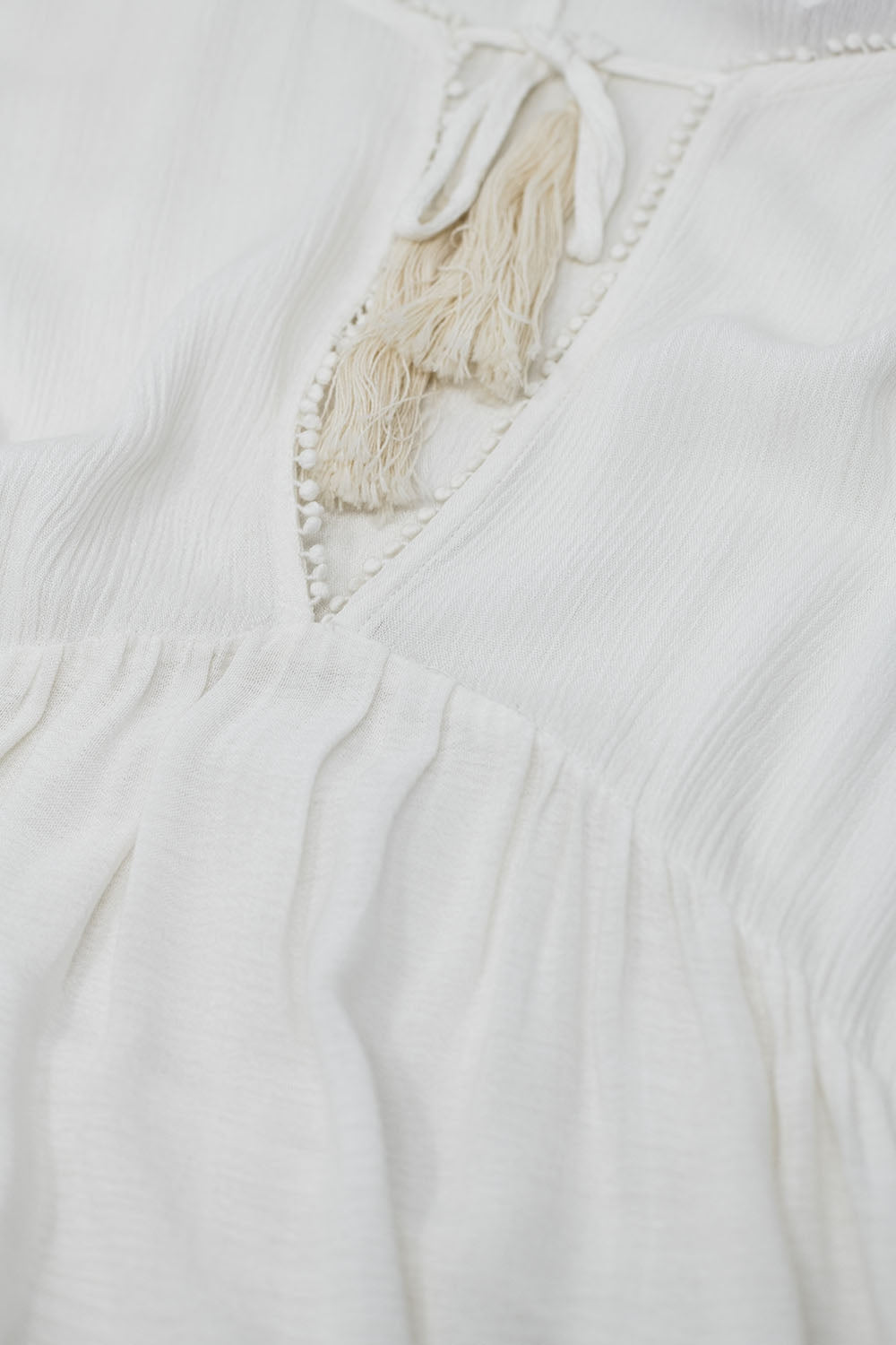 Robe courte à manches longues et détails