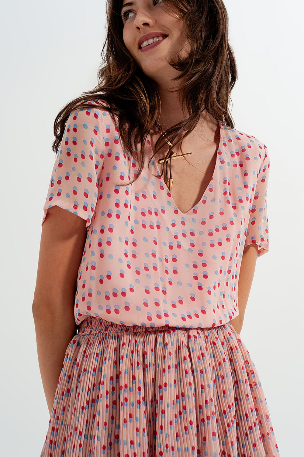 Robe courte froncée à basque rose