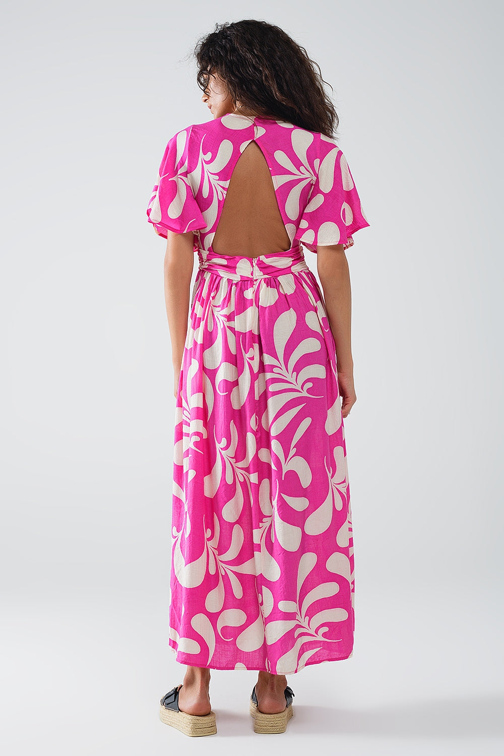 Robe longue à imprimé floral fuchsia avec dos ouvert
