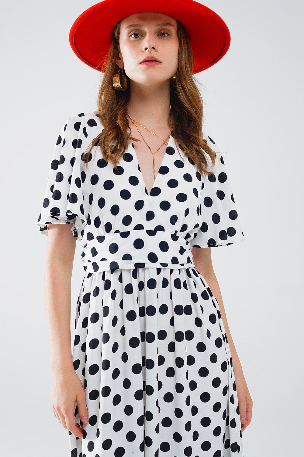 Robe longue à pois avec dos ouvert