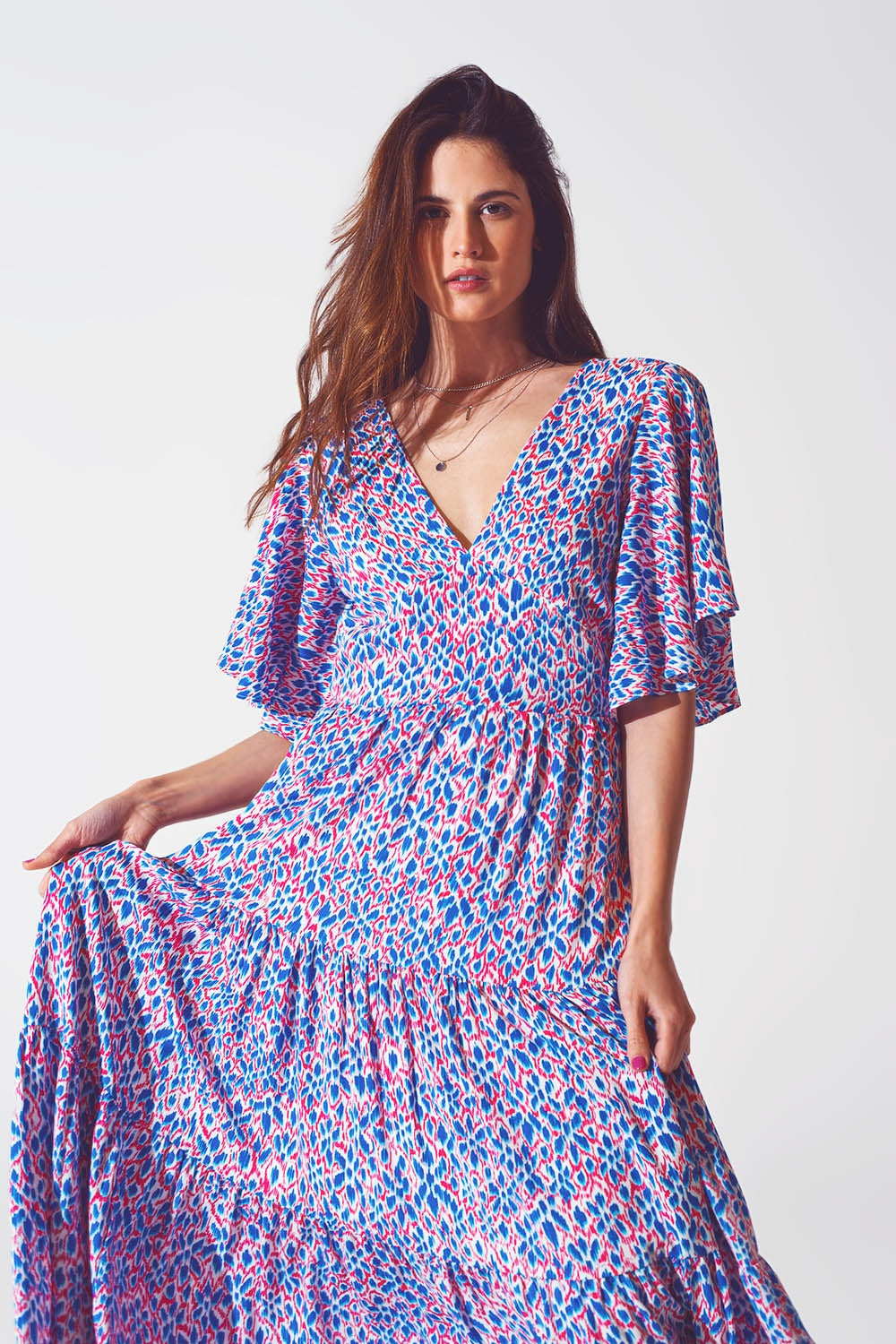 Robe longue avec dos ouvert et lien à nouer dans un imprimé violet